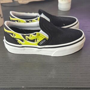 Vans Kids Classic Slip-On in Black with Yellow Flame